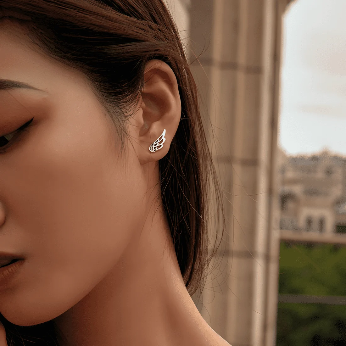 Pendientes de Botón con Alas <myexti><span>Plata de Ley 925, chapada en oro blanco, con circonitas</span></myexti> - Imagen 2