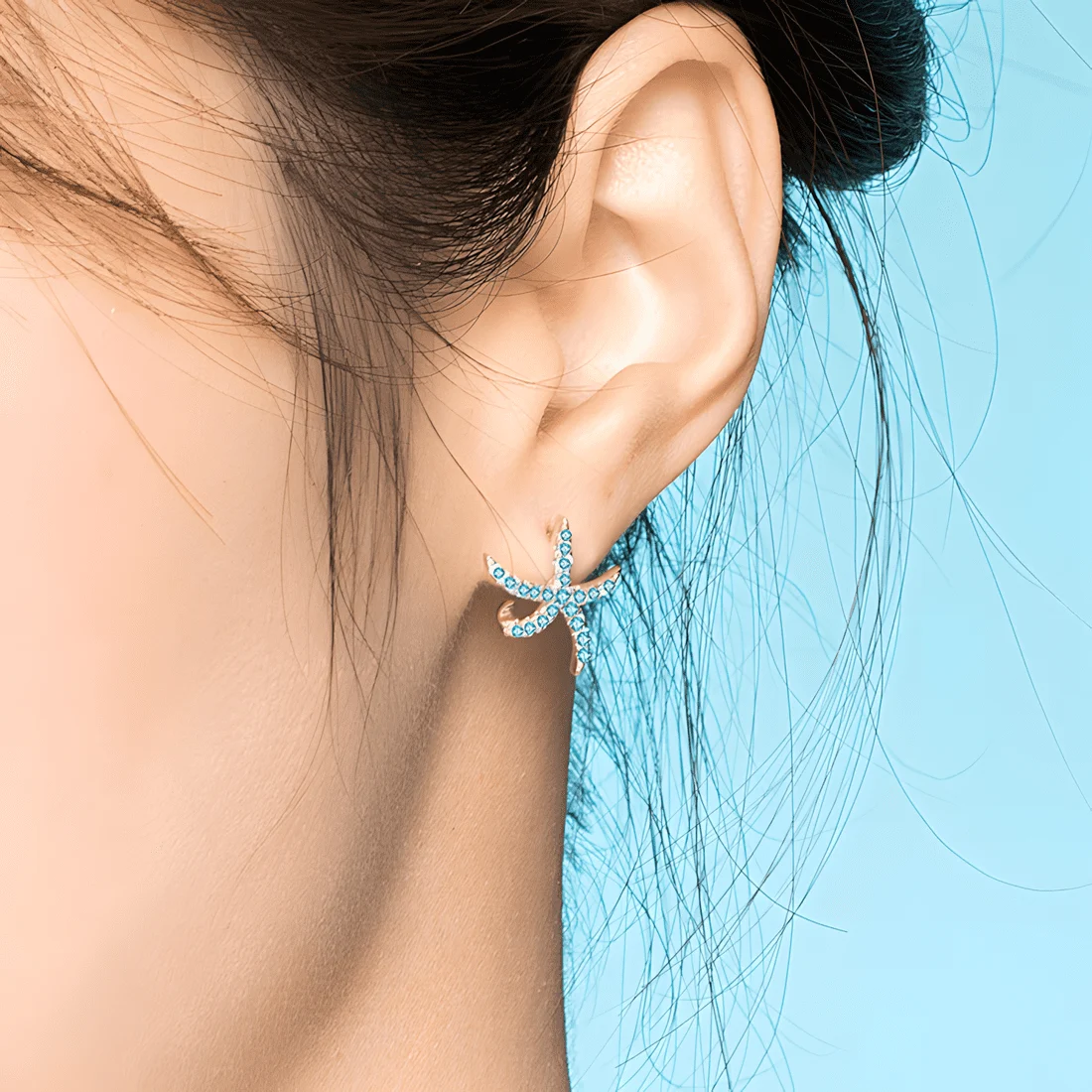 Pendientes de Botón Estrella de Mar <myexti><span>Plata de Ley 925, chapada en oro blanco, con circonitas azul claro</span></myexti> - Imagen 2