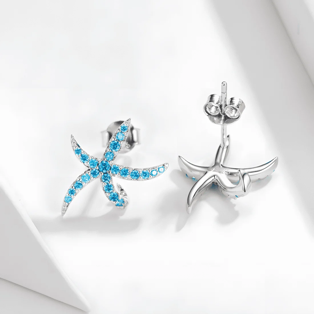 Pendientes de Botón Estrella de Mar <myexti><span>Plata de Ley 925, chapada en oro blanco, con circonitas azul claro</span></myexti> - Imagen 4