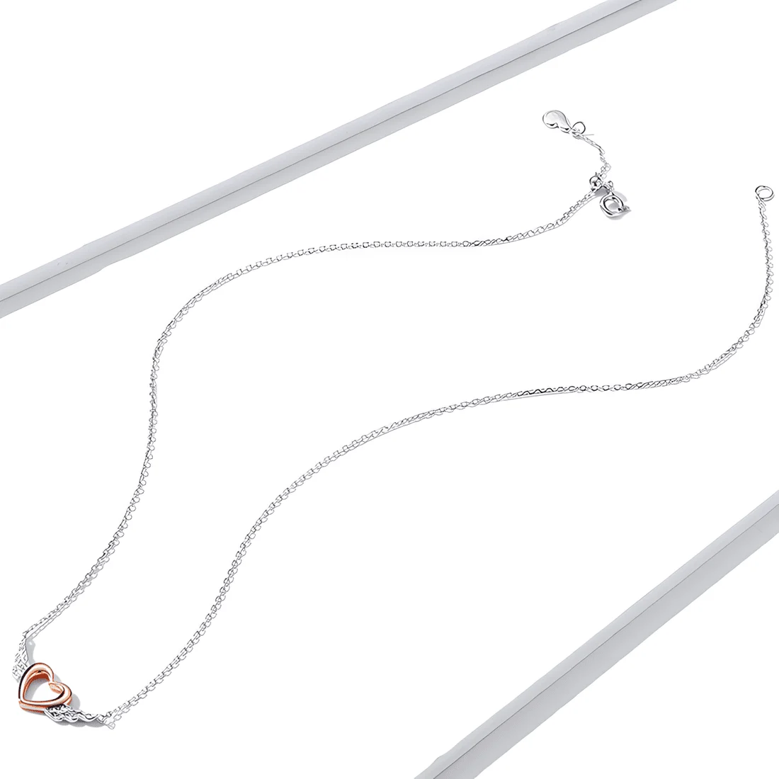 Collar Corazón Alado <myexti><span>Plata de Ley 925, chapada en oro blanco y oro rosa, con longitud ajustable</span></myexti> - Imagen 5