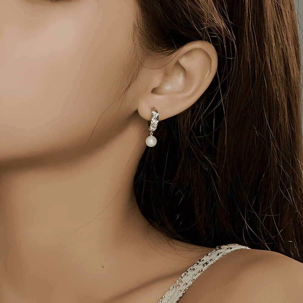 Pendientes de Aro Hojas y Perlas <myexti><span>Plata de Ley 925, chapada en oro blanco, con circonitas y perlas naturales</span></myexti> - Imagen 2