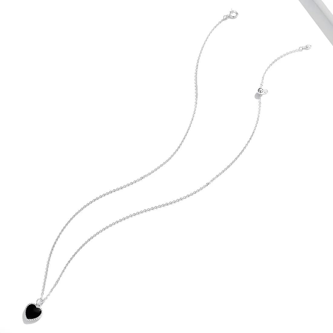 Collar con Corazón Negro <myexti><span>Plata de Ley 925, chapada en oro blanco, con colgante de ónix negro y longitud ajustable</span></myexti> - Imagen 4